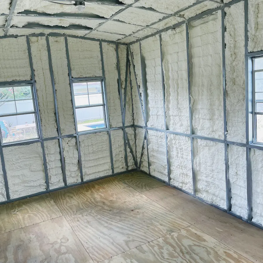 Closed-cell spray foam insulation applied to wall cavities in a residential project in Terrell